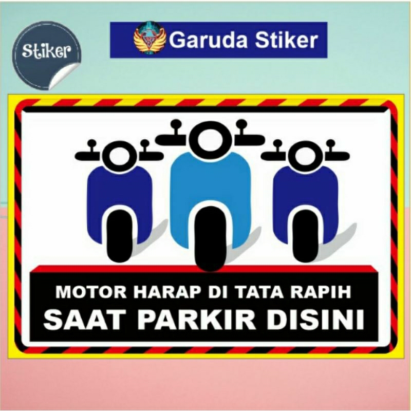 

stiker motor harap di tata rapih saat parkir disini