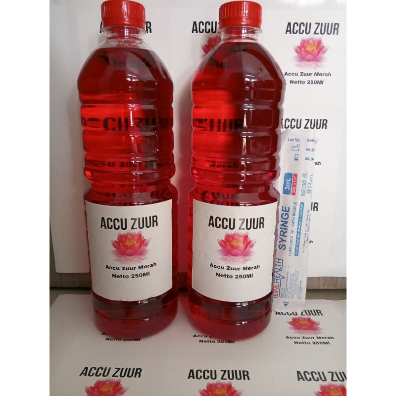 Air aki zuur merah 1liter ( paket 2 botol + suntikan )