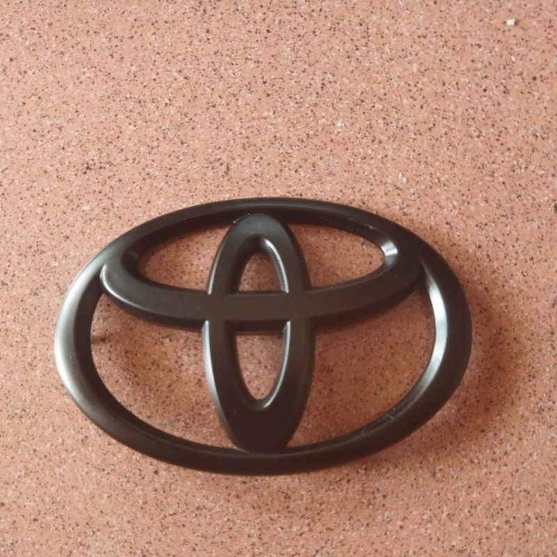 75311-BZ080 EMBLEM DEPAN RADIATOR GRILLE AVANZA-. Avanza tahun 2006-2009