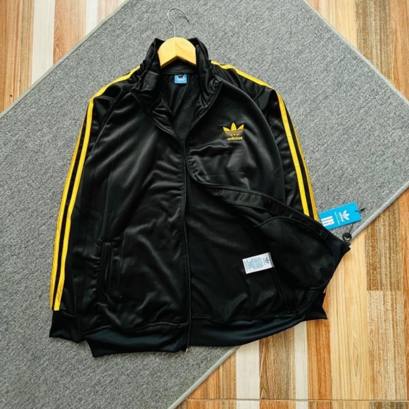 TRACKTOP ADIDAS HITAM LIST GOLD