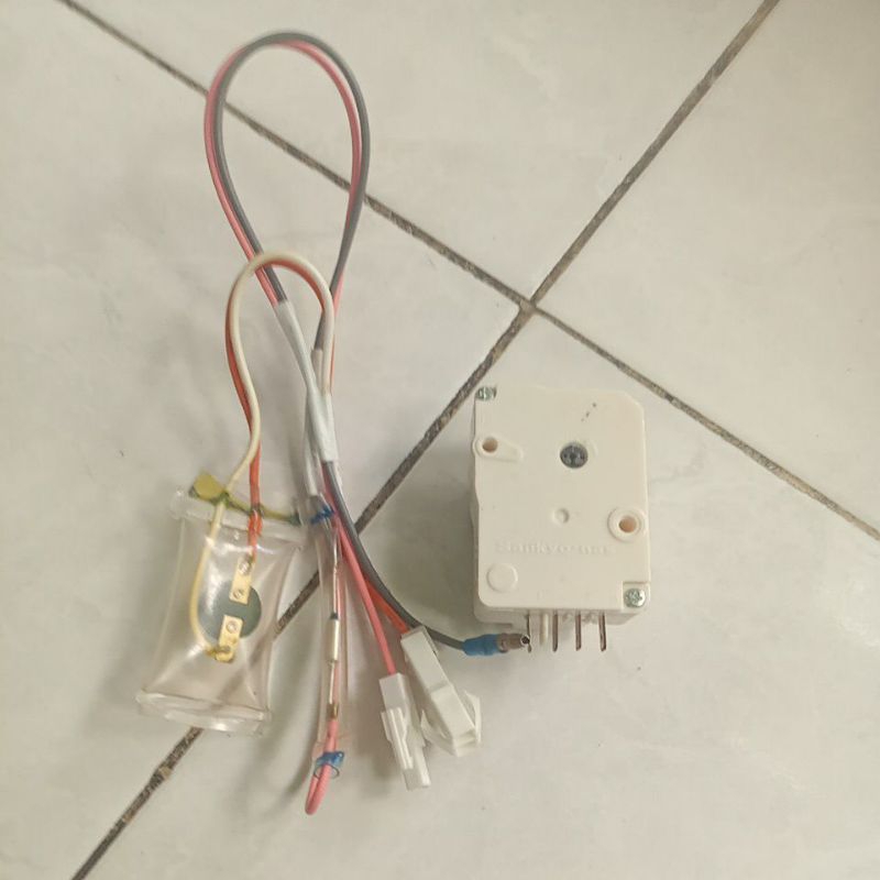 timer defrost kulkas toshiba 2 pintu