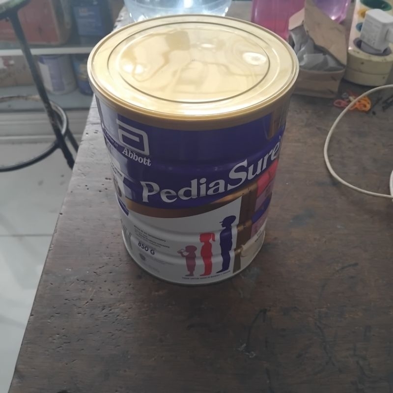 INI KALENG BEKAS YA, KALENG BEKAS SUSU MERK PEDIASURE KEMASAN 850 GRAM. DIJUAL KONDISI APA ADANYA
