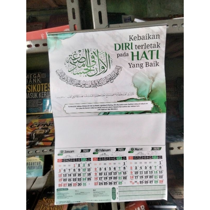 

Kalender dinding islami 2025 Masehi dan Hijriyah gambar kaligrafi