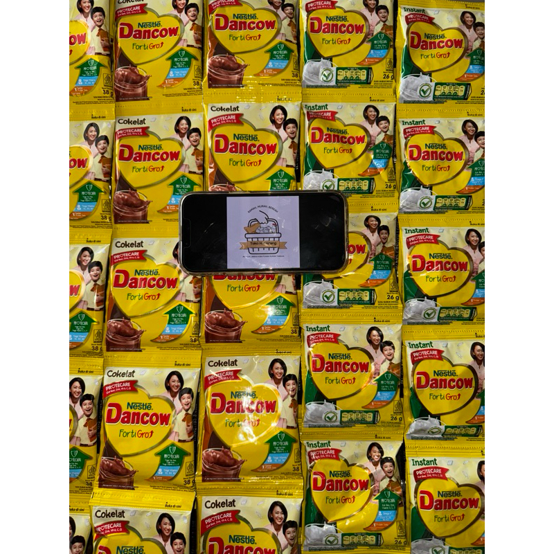 

Nestle Dancow Sachet Putih 26gr / Coklat 38gr - 1 Renceng (10 Sachet) | 1 Dus (16 Renceng)