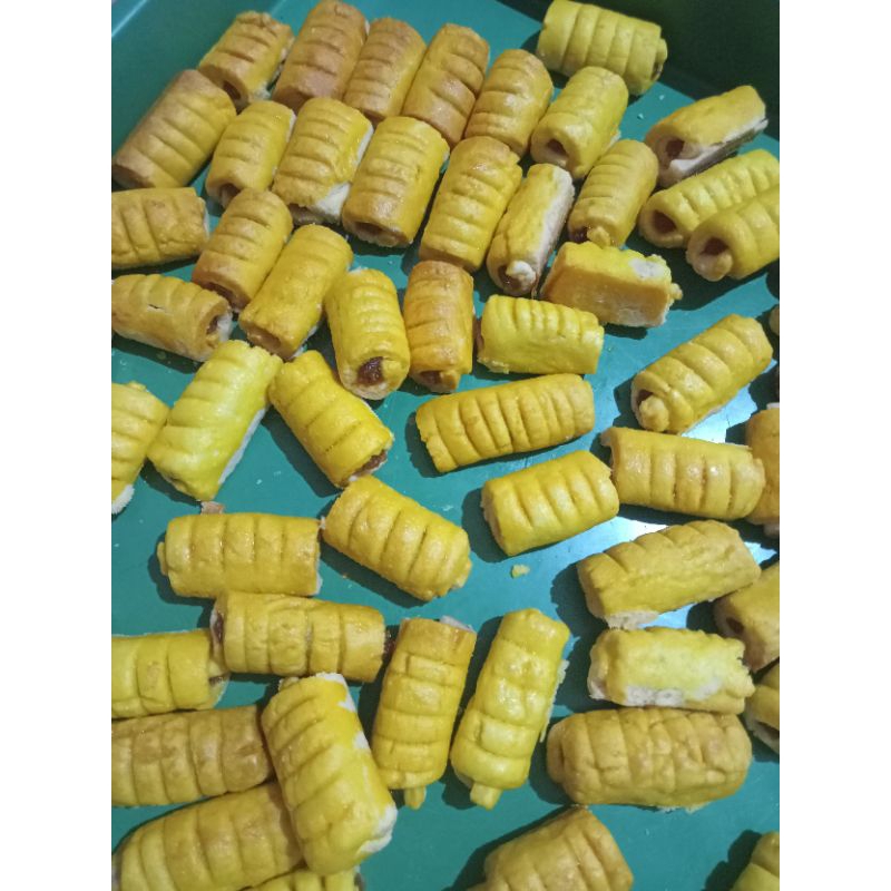 

NASTAR GULUNG SELAI NANAS (500 gram)
