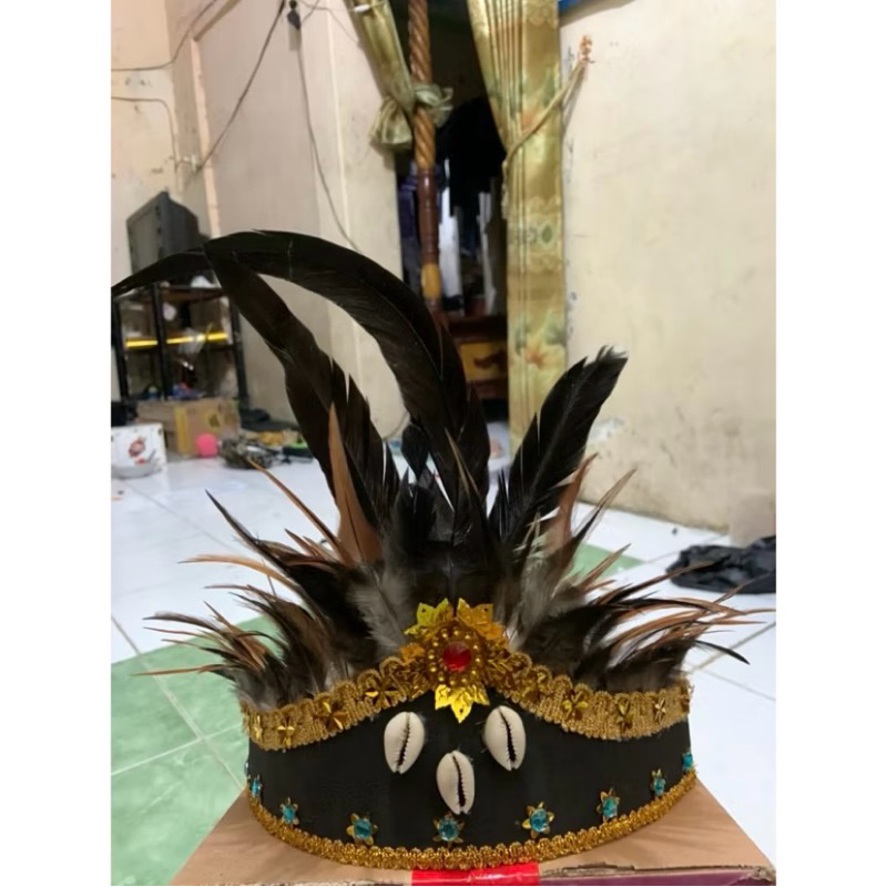 Hiasan kepala Topi adat Papua Kerang