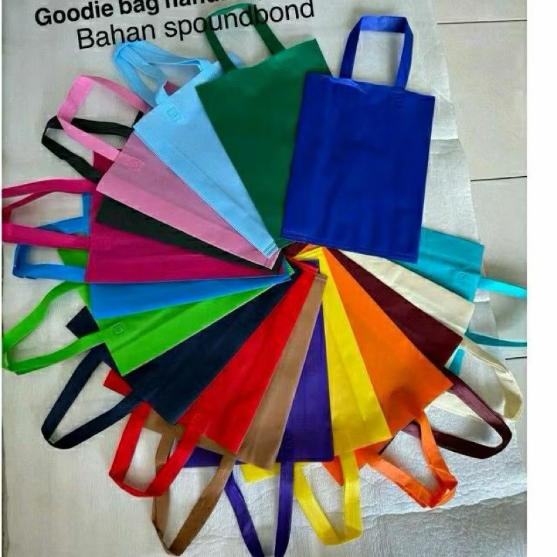 

( 12Pcs ) Goodie Bag Tas Handy Bahan Spondbond bagus berkualitas