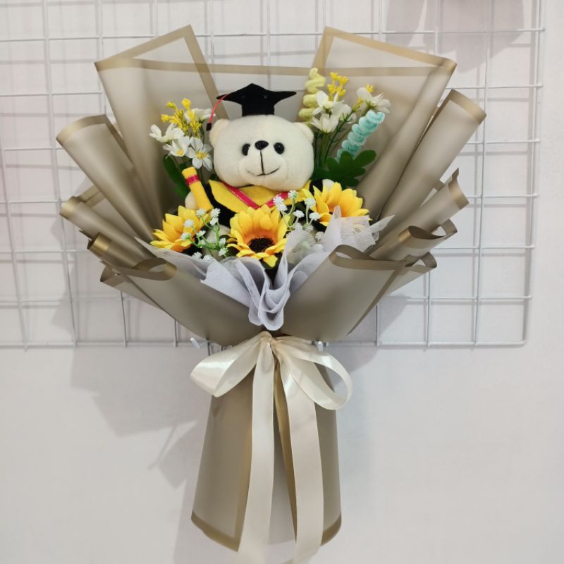 

Buket boneka wisuda/buket bunga palsu bukan asli/ buket hadiah,buket boneka,wisuda,ulang tahun