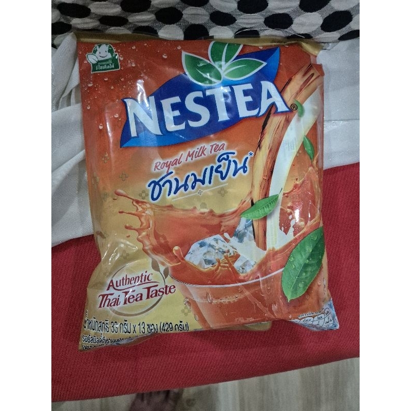 

Ready Nestea Thai tea Royal Milk Tea isi 13 stick x 33g