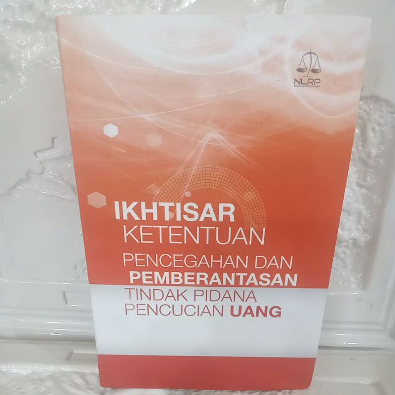 Buku Original IKHTISAR KETENTUAN PENCUCIAN UANG