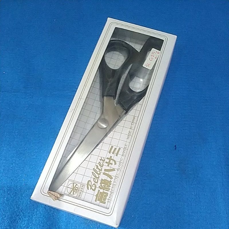 

gunting zig zag kain