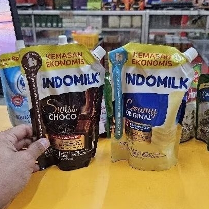 

ED 06.25 - POUCH 545GR - SKM INDOMILK RASA COKLAT - PUTIH / SUSU KENTAL MANIS