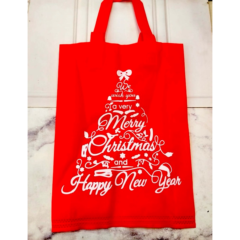 

TAS SPOUNDBOND/GOODIE BAG MERRY CHRISTMAS 30x40x8cm.1 pak isi 12pcs