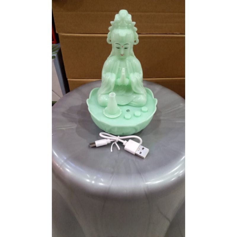 Pajangan Dewi Kwan Im ada musik Ta Pei Cou lagu sembahyang