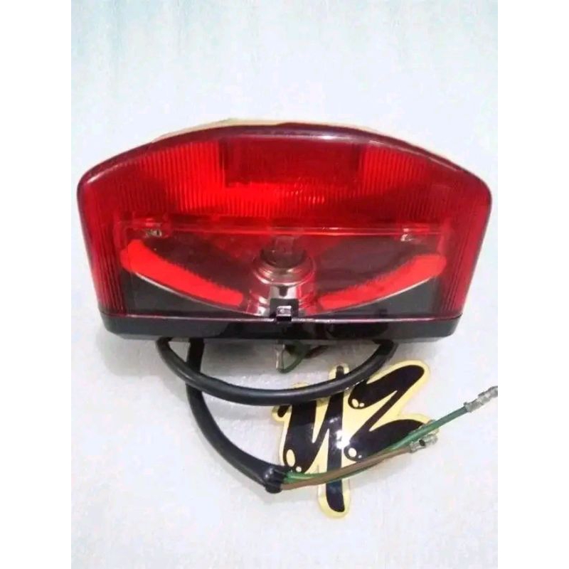 original baru lampu belakang set honda cg110n ori