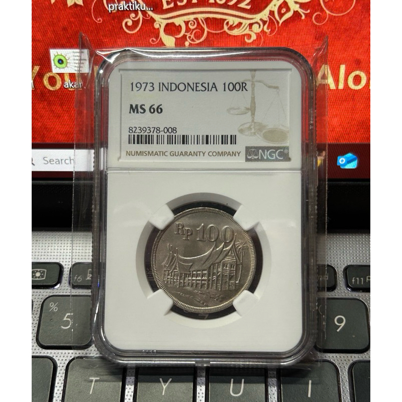 KOIN 100 Rupiah TEBAL RUMAH GADANG 1973 SERTIFIKASI NGC MS 66