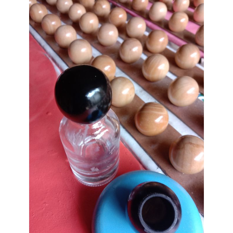 Tutup botol parfum bola kayu