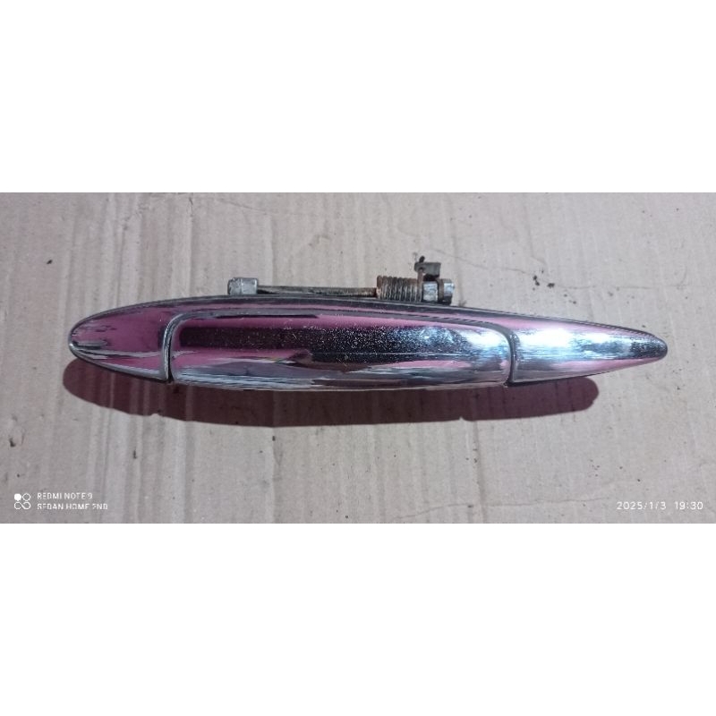 handel pintu depan nissan cefiro a31