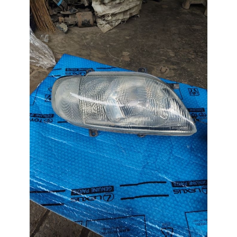 Headlamp daihatsu taruna original.
