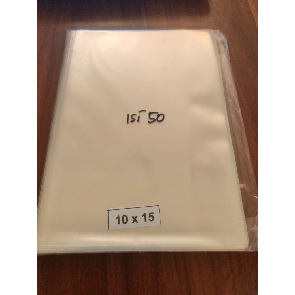 

Plastik opp kaca tanpa lem 10x15 bening transparan tebal 40 mic isi 50