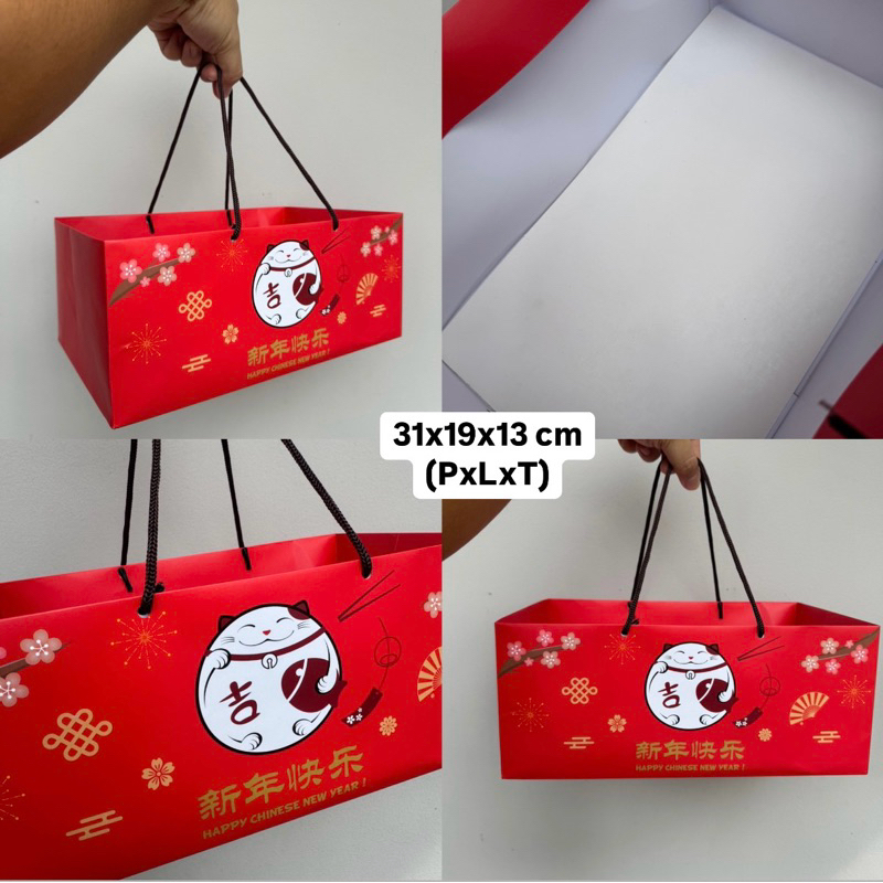 

Paperbag kecil imlek cny ted lucky cat uk 31x19x13 cm + Free Tag (Harga untuk 5 pcs dus)