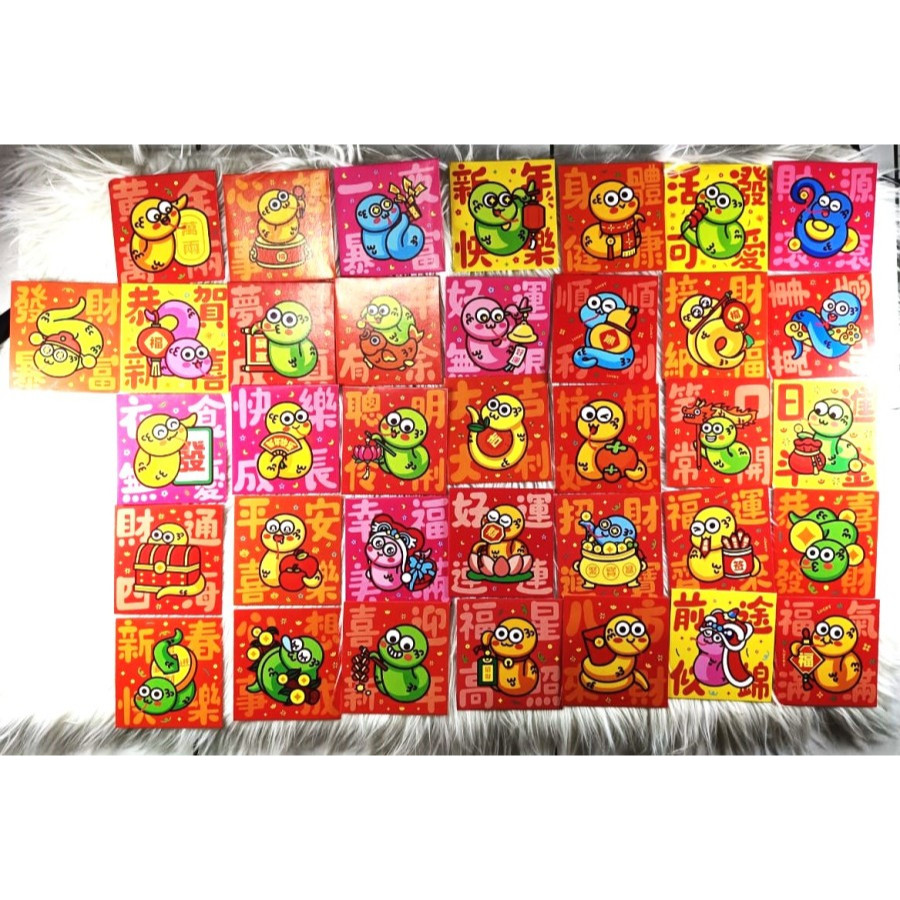 

Angpao Imlek Shio Ular Unik 4237 Isi 36 Lembar Mix Motif Sesuai Foto