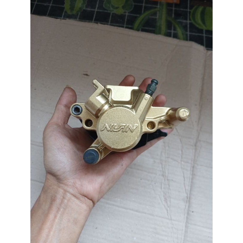 Kaliper rem belakang Supra x 125 Pala babi Supra x 125 ori lepasan