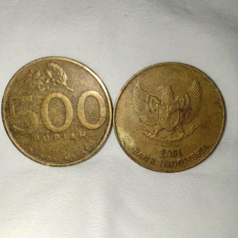 Uang koin lama dan antik 500 rupiah tahun 2001 gambar Burung Garuda dan Bunga Melati