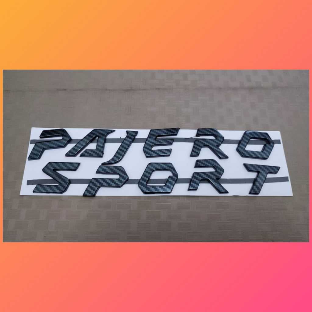 emblem kap mesin tulisan pajero sport warna carbon