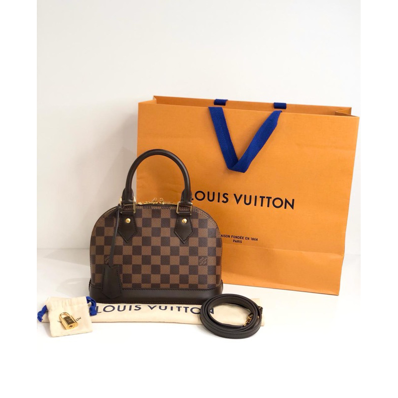 Louis Vuitton Tas Kulit Hitam dan Coklat