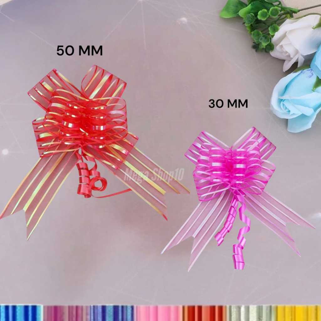 

Pita tarik Salju / Pita serut Organdi isi 10pcs