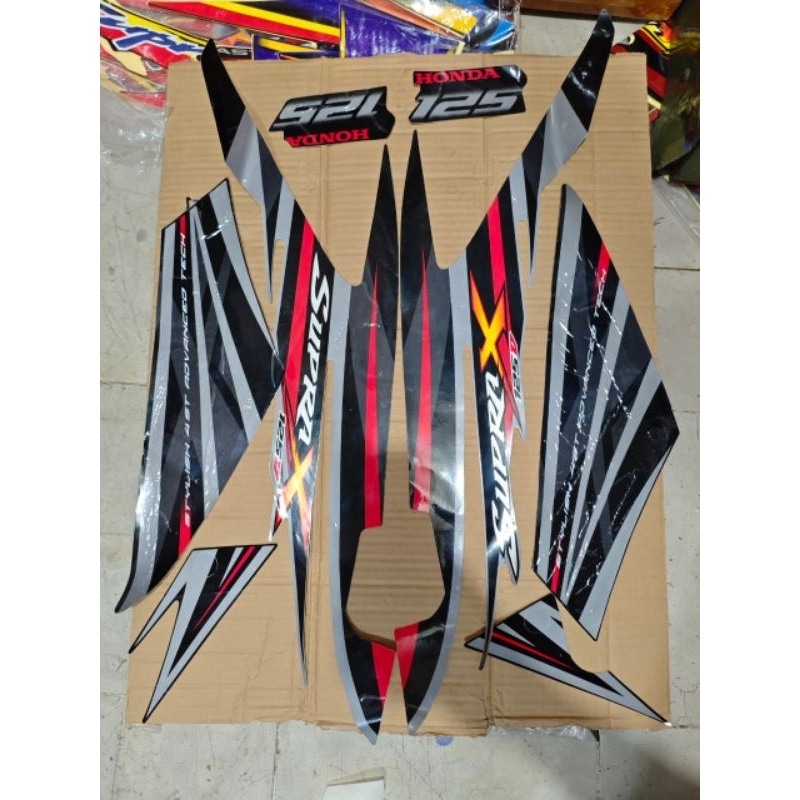 STRIPING BODY STIKER BODI SUPRA X 125 D 2009 HITAM MODEL ORI