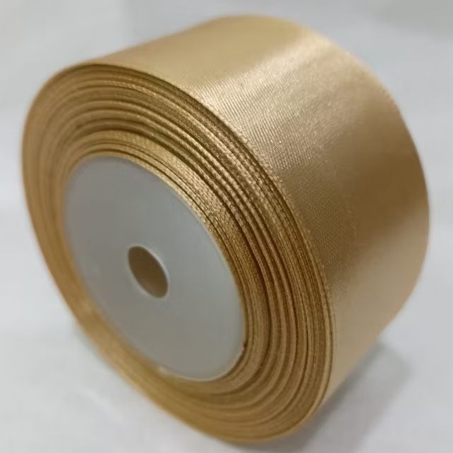 

Pita satin coklat muda 1.5 inch / 3.81 cm Per roll