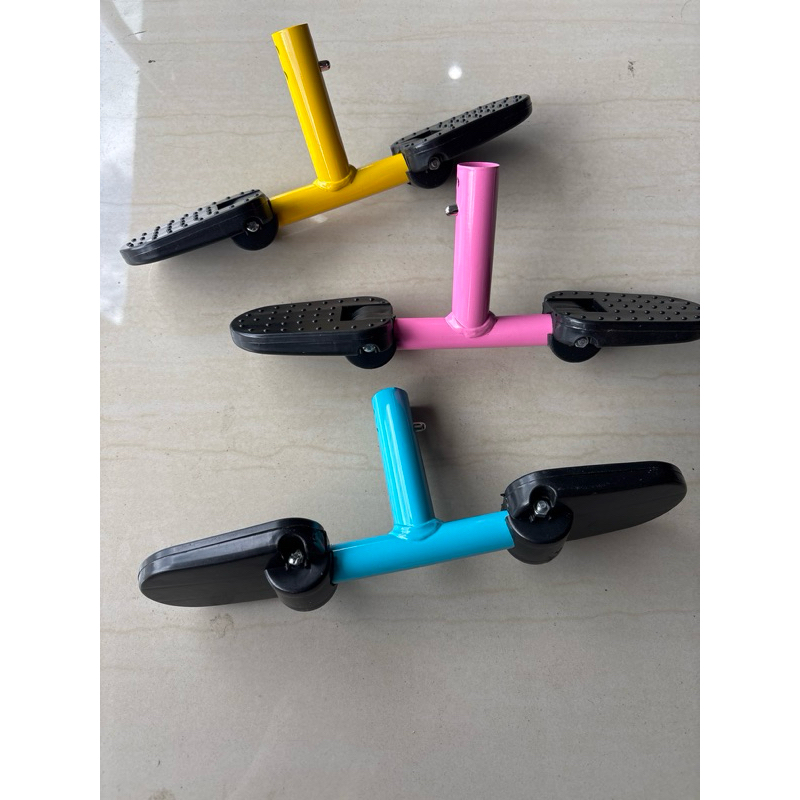 pijakan kaki tengah sepeda anak roda tiga Genio family exotic