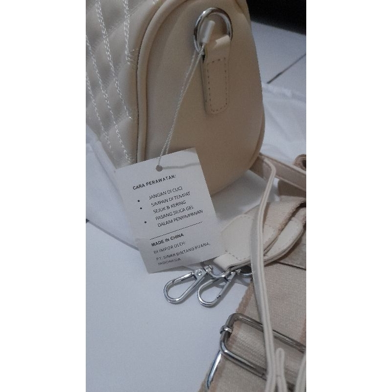 Preloved sling bag donatello - beige