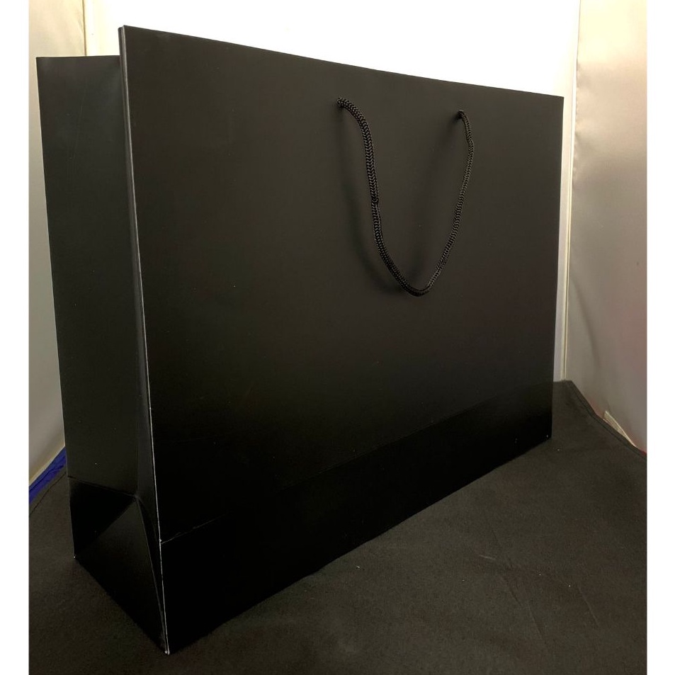

Paperbag White and black Doff Uk 4 x 3 x 12 cm