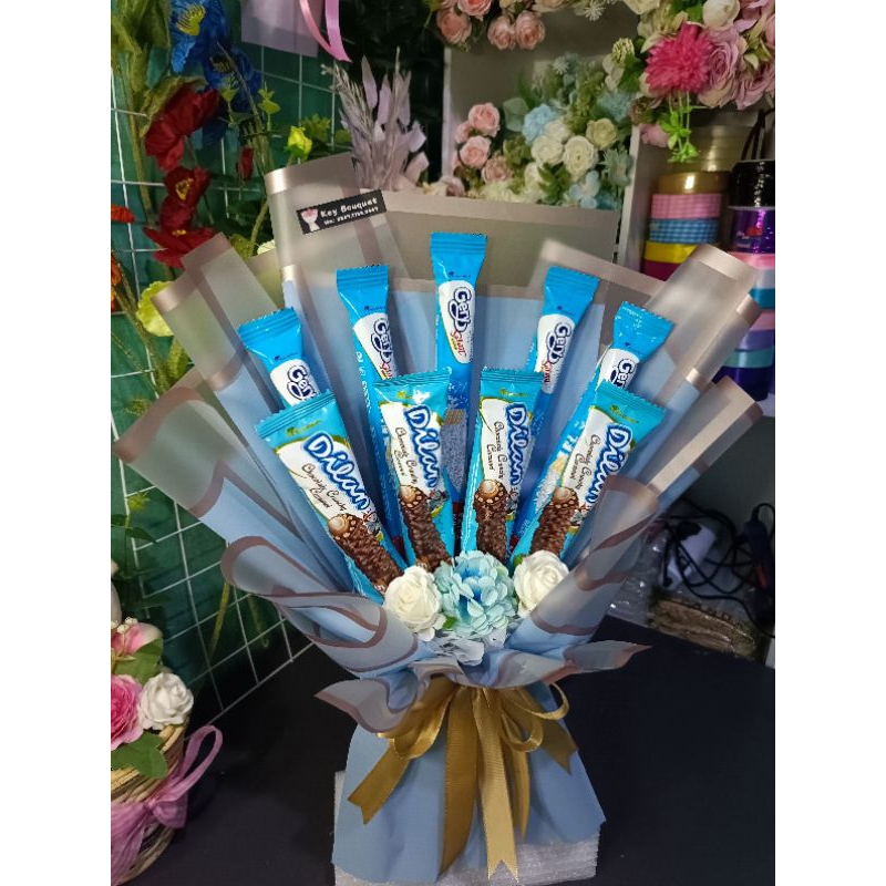 

buket snack dan bunga artificial serba biru hadiah ulang tahun wisuda