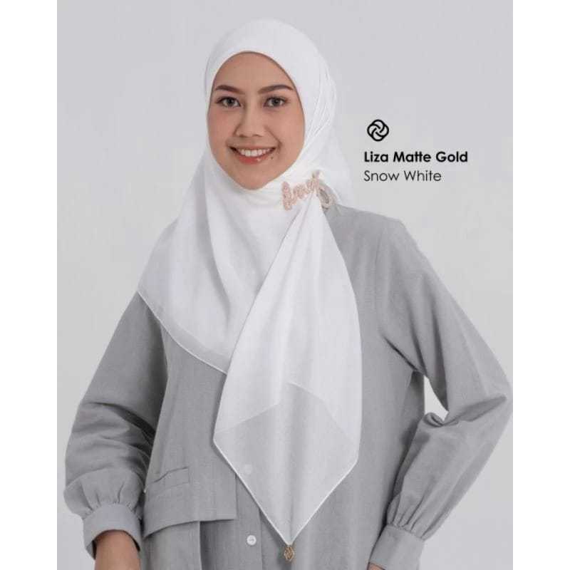 LIZA SNOW WHITE (PUTIH TULANG) JILBAB POLOS DEENAY NEW LOGO MATTE GOLD DAN  LOGO BESI GOLD