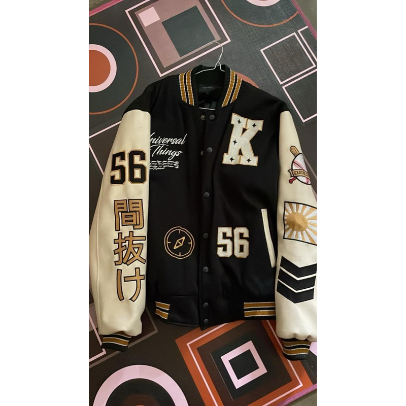 varsity karung jantan size M