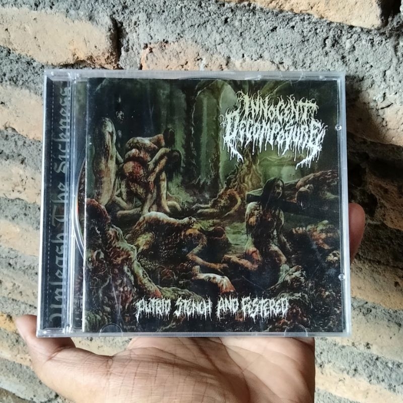 CD INNOCENT DECOMPOSURE - PUTRID STENCH AND FESTERED