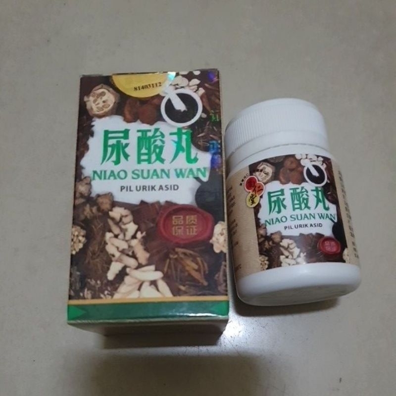 Niao Suan Wan  pil urik Asid DUS COKLAT