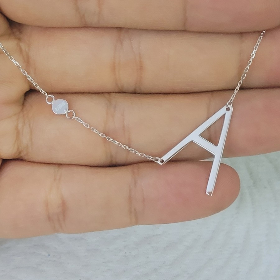 kalung model siem huruf A emas 75% 750 17k