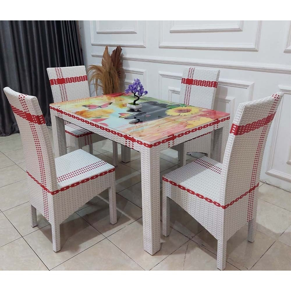 Meja Makan Rotan 4 Kursi Kaca Motif