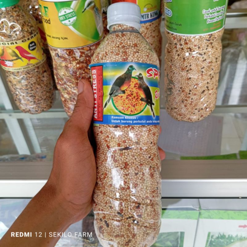 Pakan burung perkutut 1 botol qua