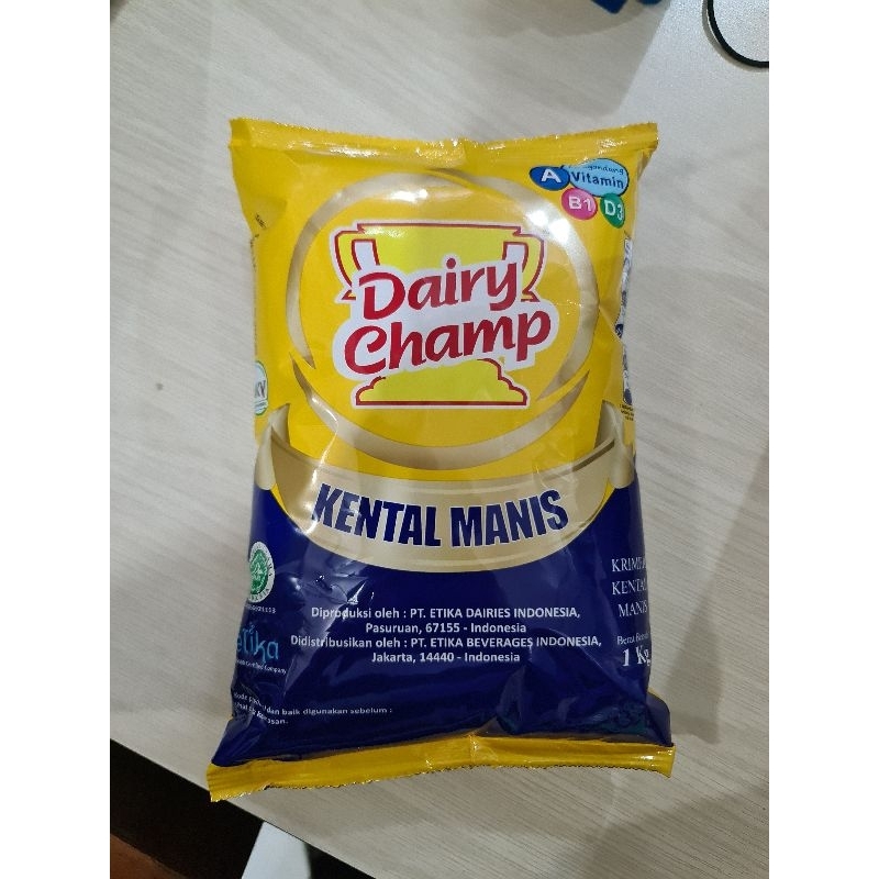 

Susu Kental Manis Dairy Champ Kemasan 1 Kg-Kemasan Pouch Bantal