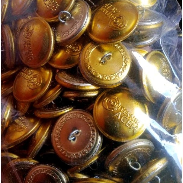 kancing jaket almamater politeknik aceh