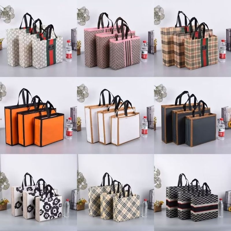 

Tas Belanja Tahan Air Pegangan/Tas Spunbond / Goodie Bag Spunbond
