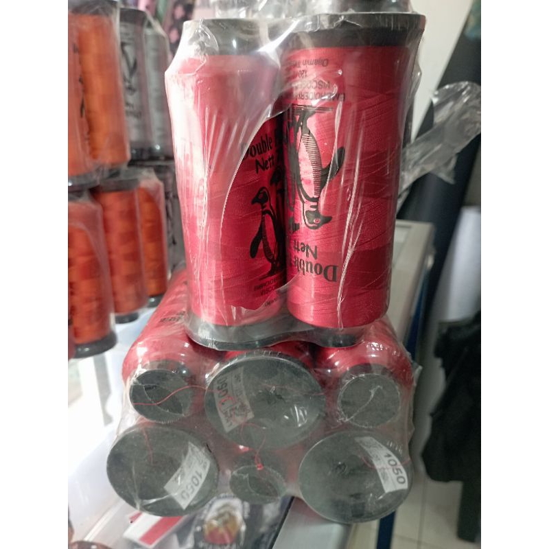 BENANG RAYON BORDIR. doble pinguin  merah 1050