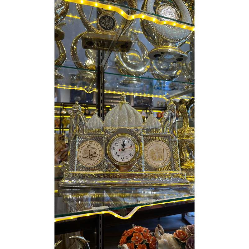 kaligrafi jam Allah Muhammad