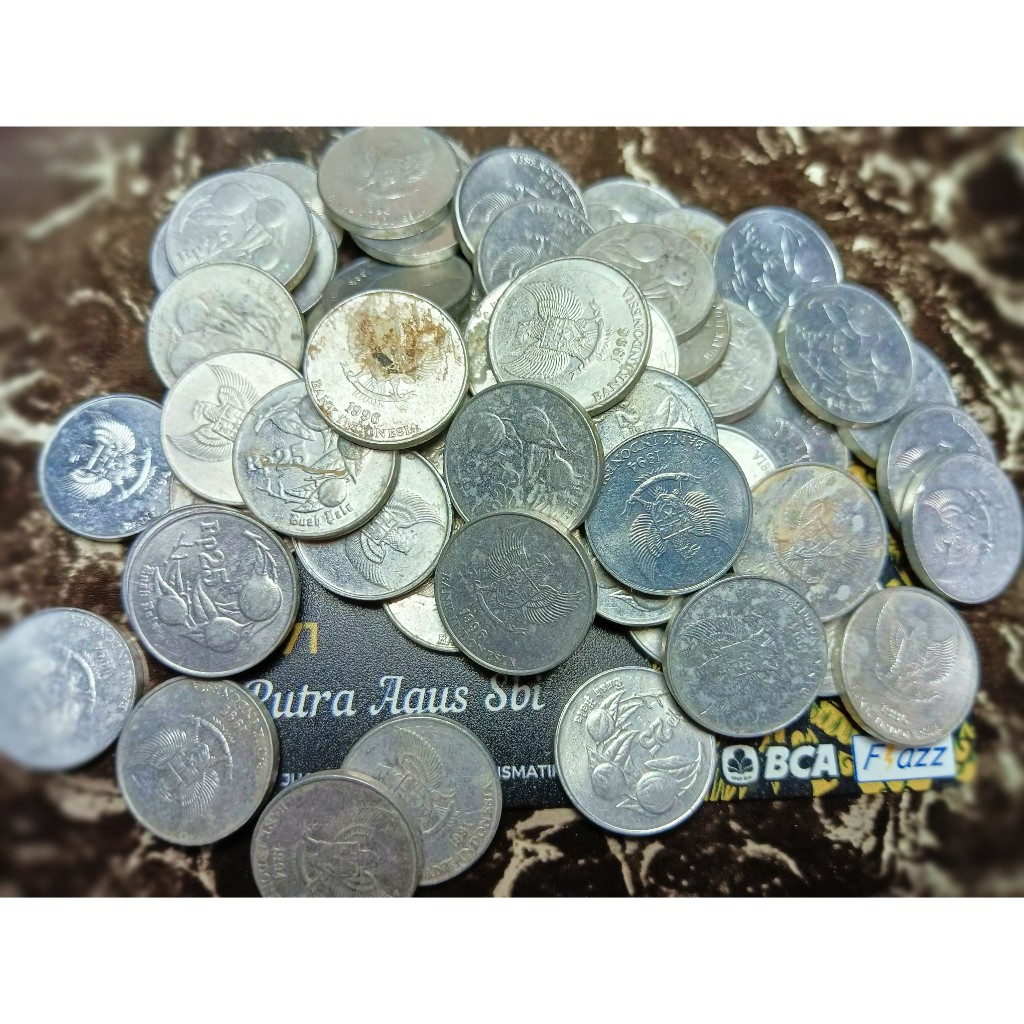 uang 25 rupiah buah pala ory sesuai foto